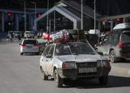 Rusi odlaze u Gruziju, Foto: Irakli Gedenidze/Reuters