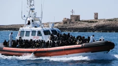 Migranti na Lampedusi/Ilustracija